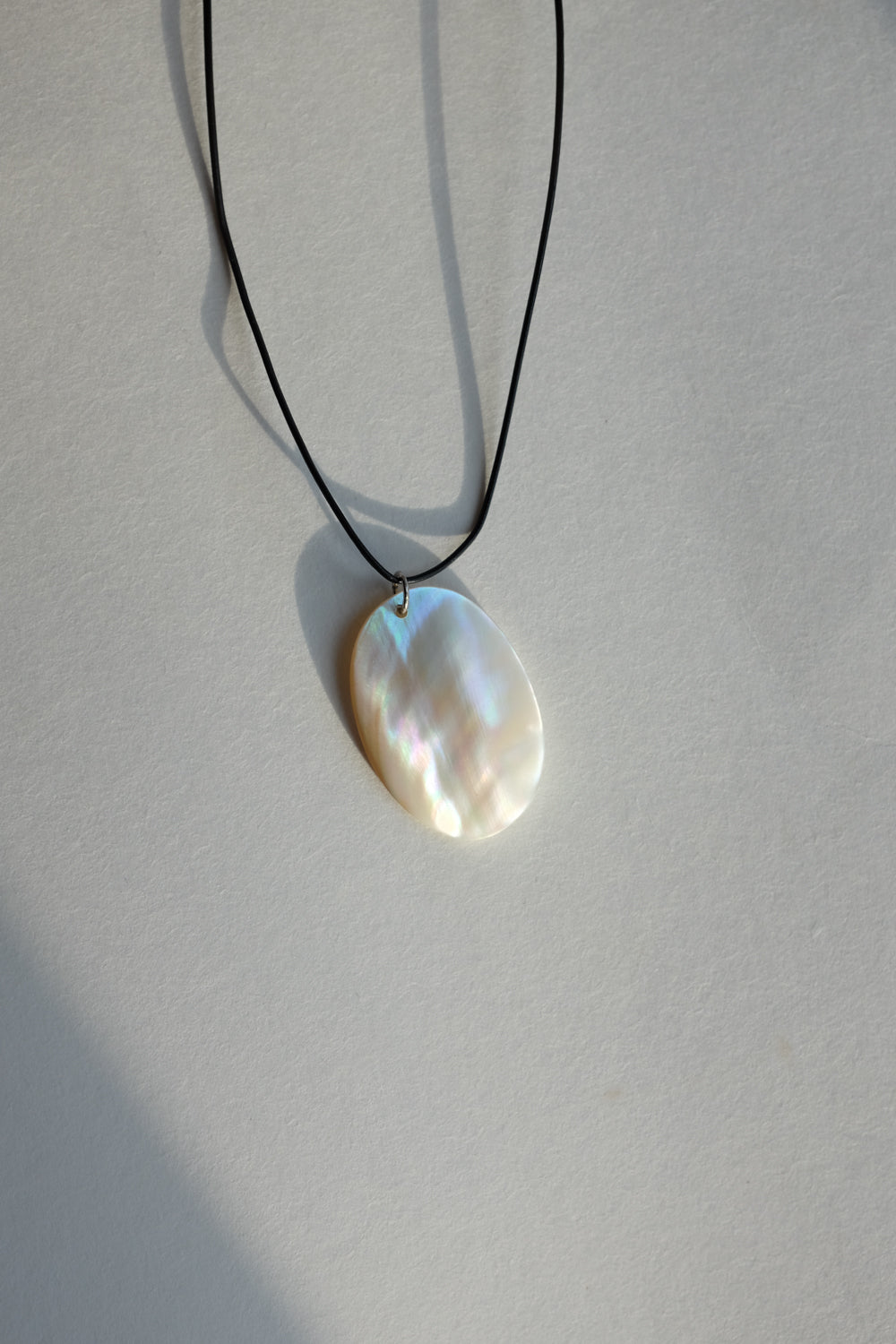LONG LEATHER MOTHER OF PEARL NECKLACE