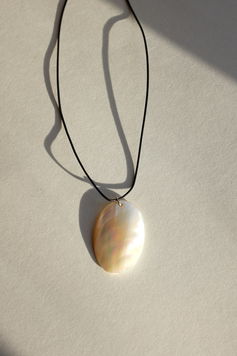 LONG LEATHER MOTHER OF PEARL NECKLACE