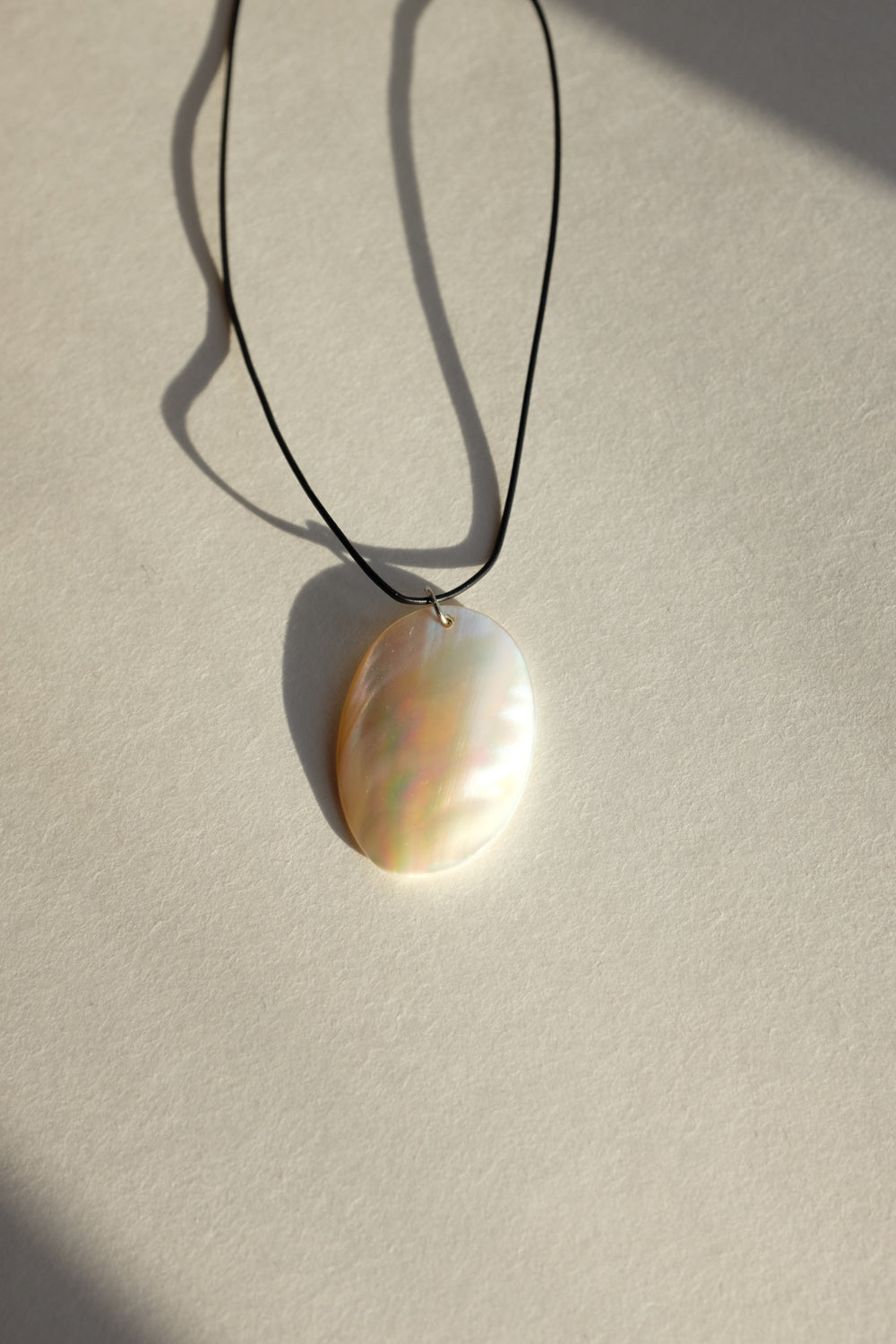 LONG LEATHER MOTHER OF PEARL NECKLACE