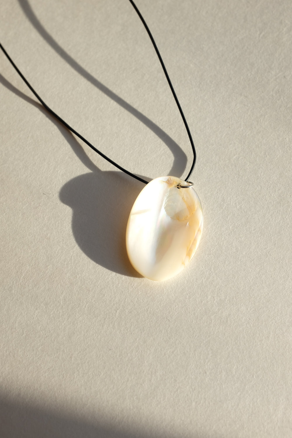 LONG LEATHER MOTHER OF PEARL NECKLACE