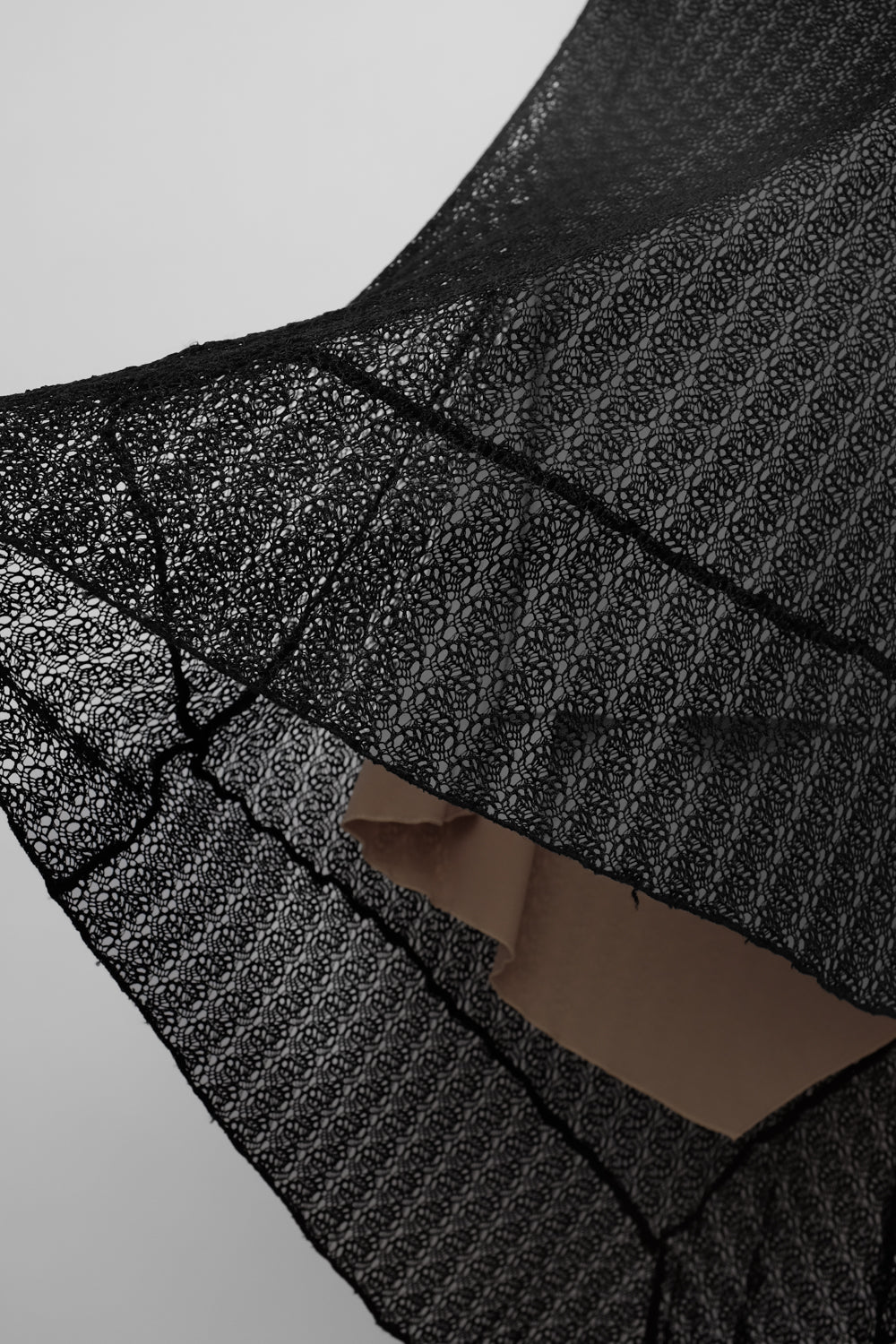 ASYMMETRICAL BLACK LACE SKIRT