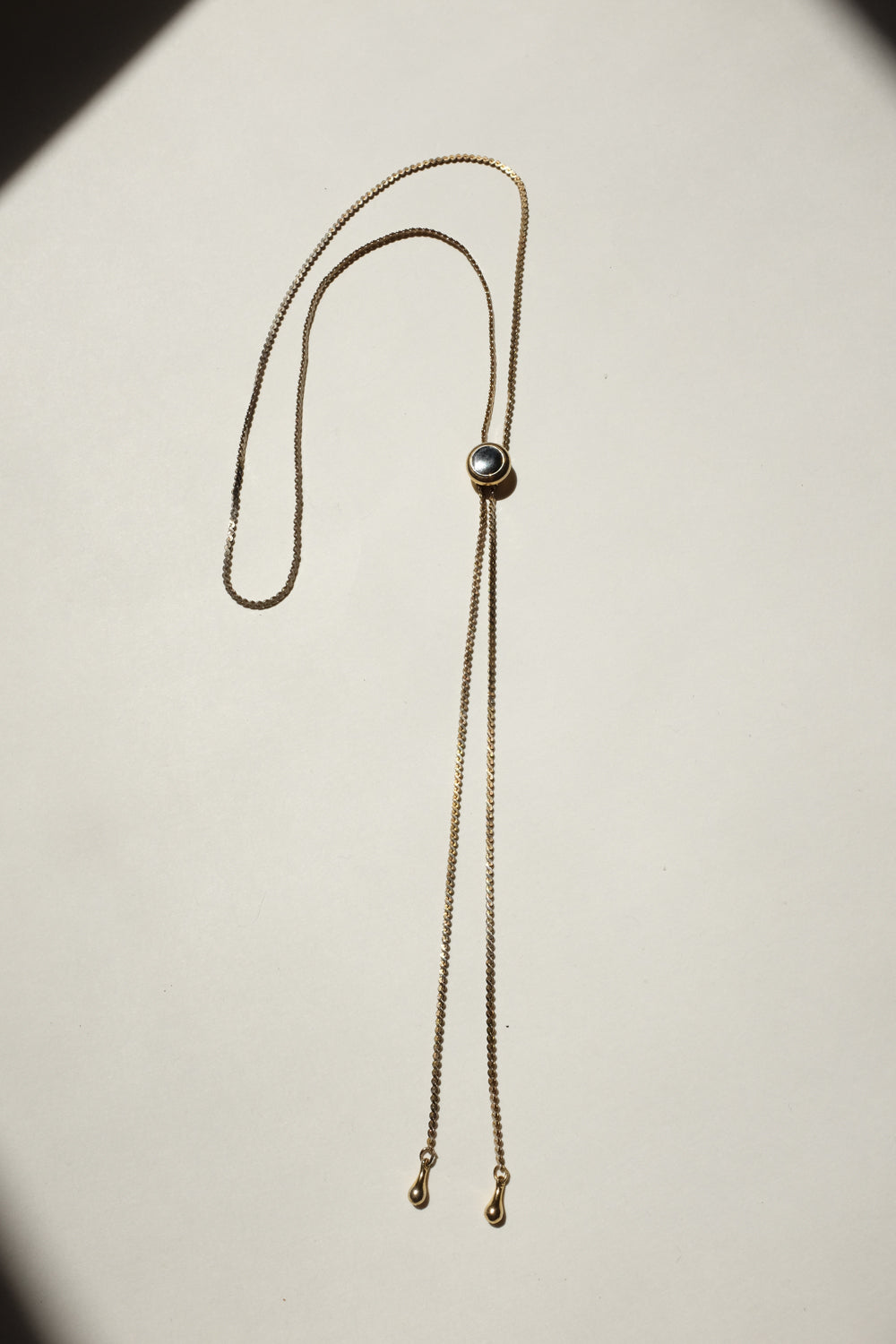 LONG GOLD VINTAGE NECKLACE WITH BLACK STONE