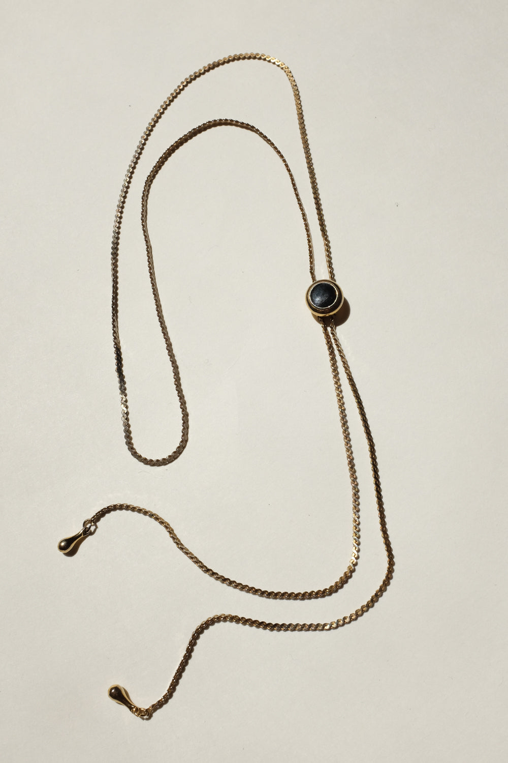 LONG GOLD VINTAGE NECKLACE WITH BLACK STONE