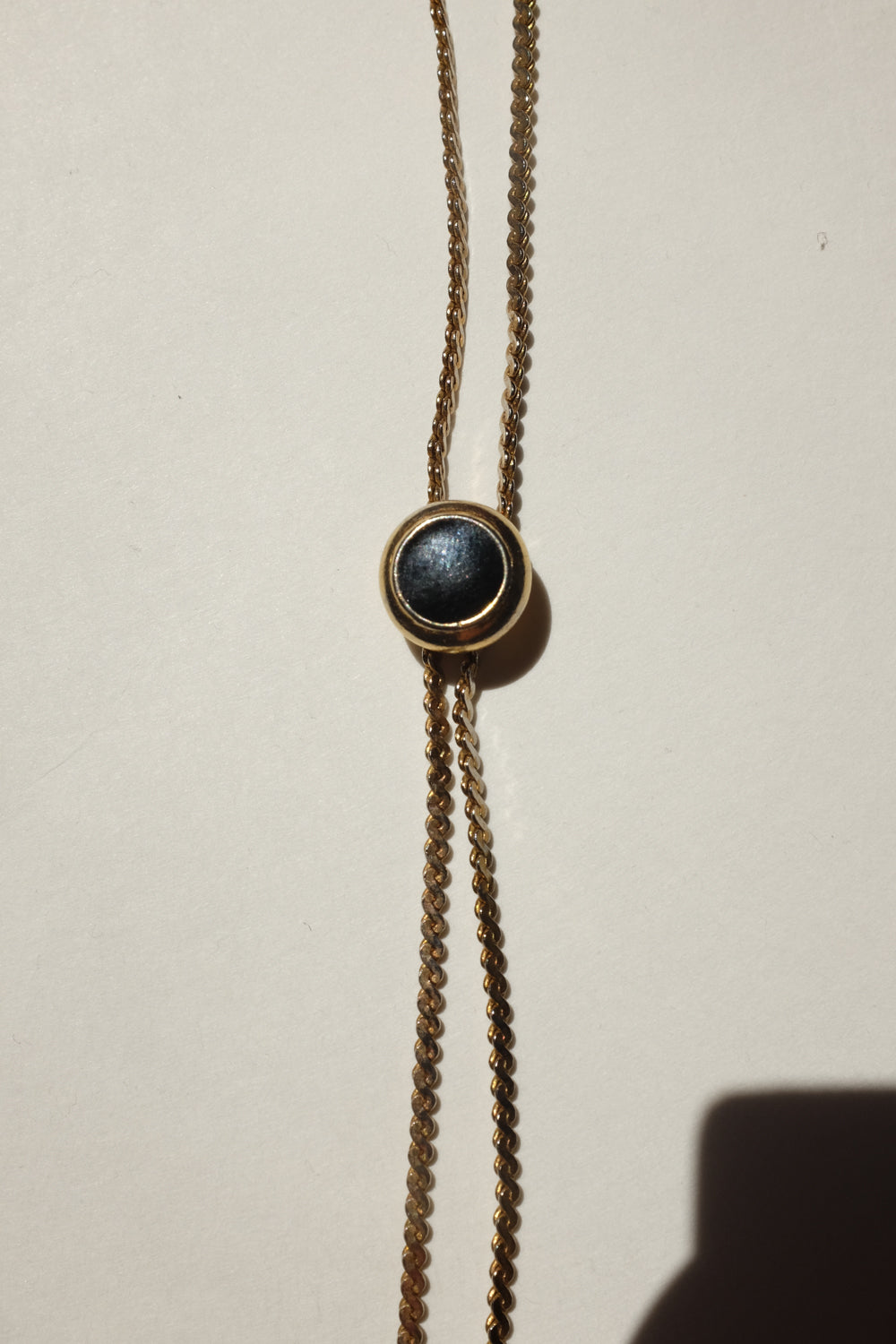 LONG GOLD VINTAGE NECKLACE WITH BLACK STONE