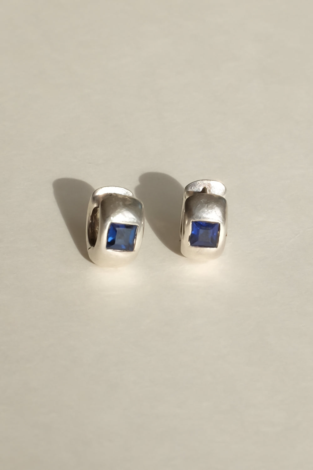 SMALL BOLD SILVER 925 HOOPS WITH BLUE STONE